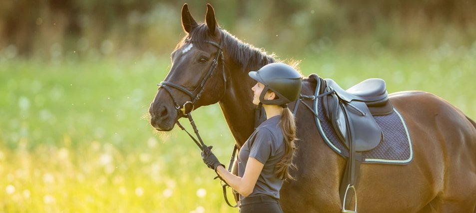 female student and a horse